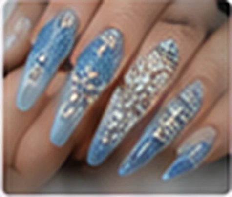 Blue embellished acrylic nail art
